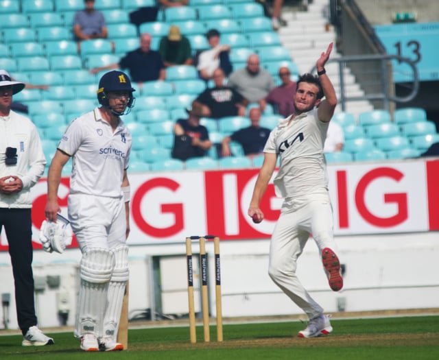 Surrey held to draw as title battle heats up