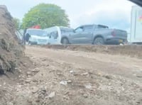 Caravan encampment set up in Surrey Hills National Landscape area