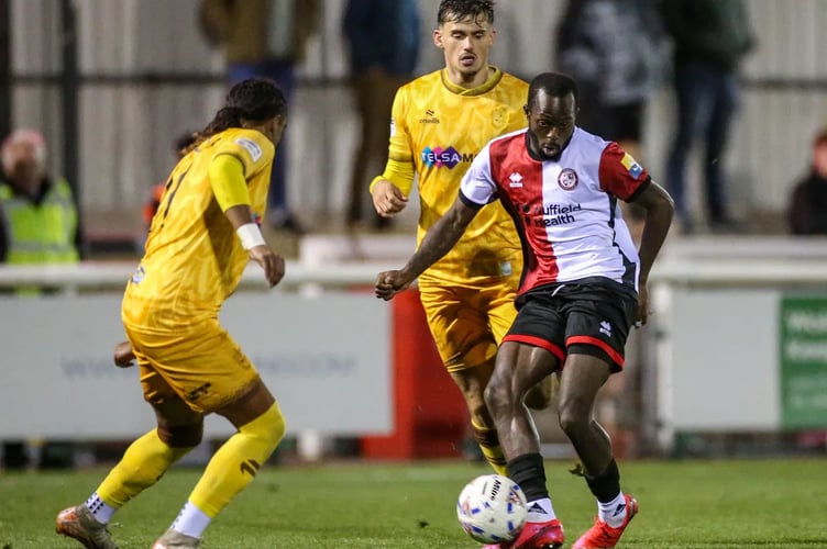 Josh Osude keeps Woking moving forward (Photo: Phil Fiddes)