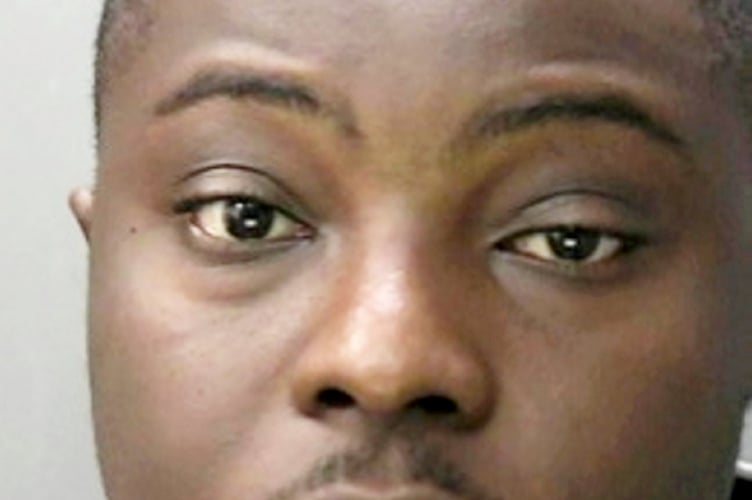 Kwabena Edusei. // Members of a 'cruel' romance fraud gang who duped a hundred victims from across the world into sending nearly £2m have been jailed. Five criminals were found to have perpetrated a complex fraud by meeting victims on dating apps under fake identities before tricking them into sending large quantities of money. Impact statements from some victims highlighted the distress and devastation the fraud had caused, with some saying they'd lost their homes. Others said they felt 'ashamed' at having been scammed, saying it had 'ruined' their lives and that they still hadn't told their families. Five members of the fraud gang - Kwabena Edusei, George Melseaux, Fawaz Ali, Michael Quartey and Ebenezer Tackie - were handed prison sentences for their involvement in the fraud, following a six-week trial at Guildford Crown Court earlier this year. The court heard that the wider organised crime group is believed to have used at least seven false identities to defraud a total of 99 victims, who lost a total amounting to £1.8m. A total of £2.37m was laundered by Edusei, Melseaux, Ali, Quartey and Tackie from the proceeds of this romance fraud and other fraud offences.