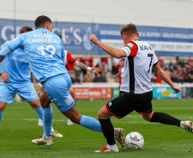 Point apiece after breathless encounter in windswept Woking