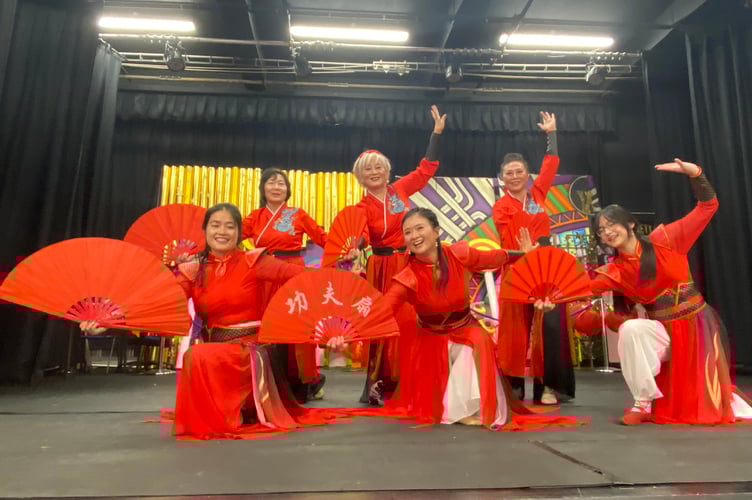 Dancers kick off the Mid-Autumn Festival at St John the Baptist School, delighting nearly 200 guests