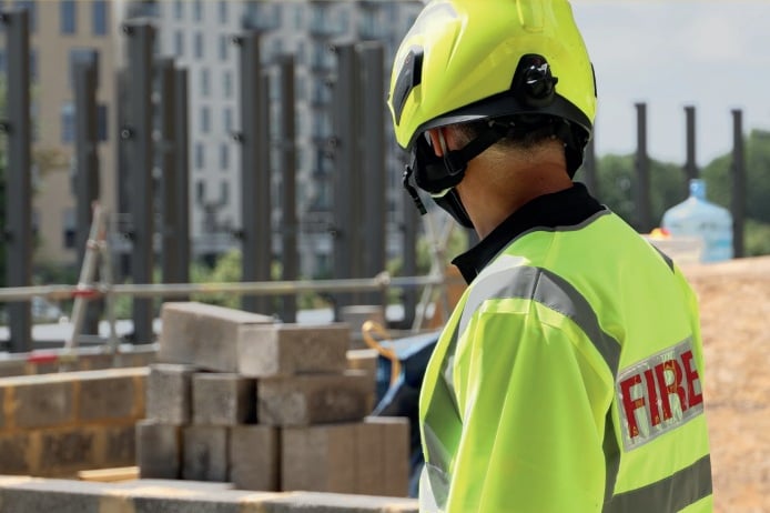 A Surrey Fire and Rescue Service firefighter.