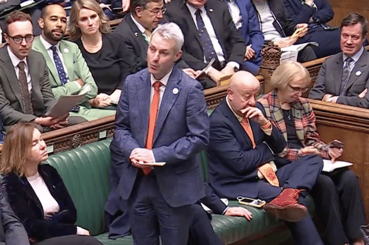Woking MP Will Forster asks a question about Surrey elections during PMQs.
