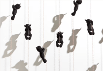 Childlike objects explore themes linked to concepts of memory and home
