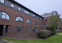 Flats closed and visitors banned at Woking block blighted by drug users