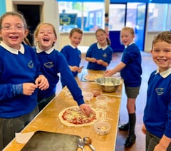 Horsell pupils enjoy a slice of Roman history from pizzeria