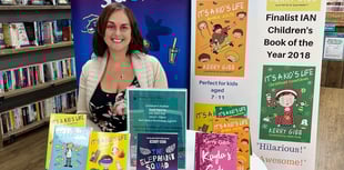 Author signs up to helping hospice