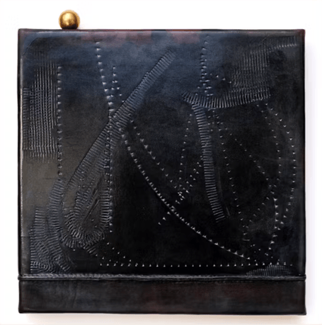 Frances Pinnock's 2024 work Light Sleeper, made from leather, brass, horse hair, iron sulphate, calligraphy ink and shellac. 