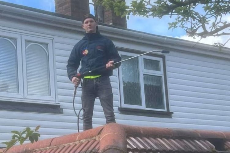 Convicted rogue roofer Joseph Smith on a roof.