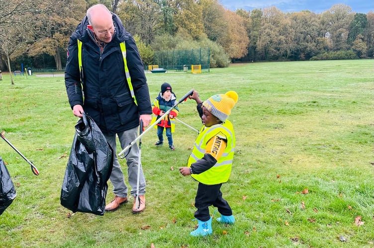 Seedlings Preschool pupils join councillors to keep St John’s tidy during a hands-on litter-picking session.