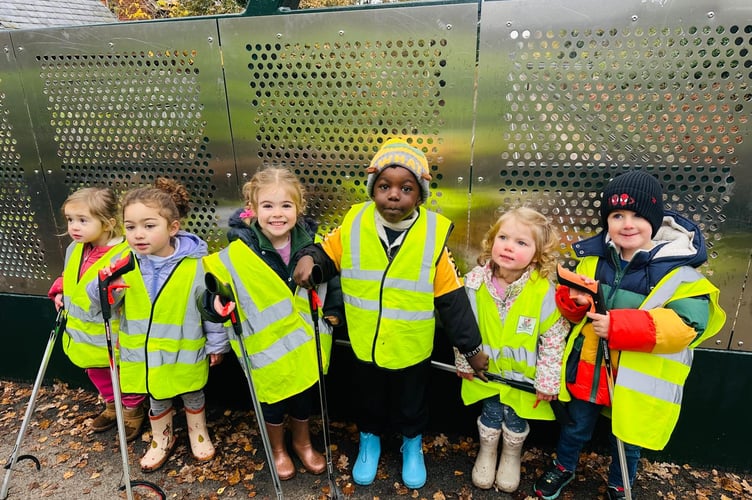 Seedlings Preschool pupils join councillors to keep St John’s tidy during a hands-on litter-picking session.