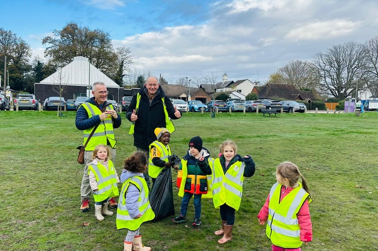 Seedlings Preschool pupils join councillors to keep St John’s tidy during a hands-on litter-picking session.