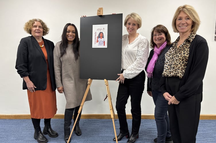 Help is available: The all-female panel behind Woking’s bold new domestic abuse awareness artwork.