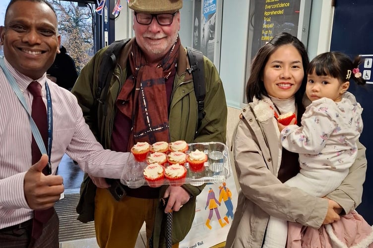 A slice of history — and cake — for West Byfleet passengers on the station’s 138th birthday