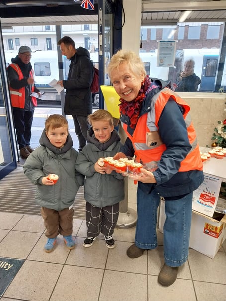 A slice of history — and cake — for West Byfleet passengers on the station’s 138th birthday