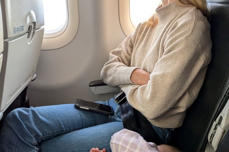 Minna Havstad with daughter Malva in economy class.  A couple split their parenting duties on flights by buying one ticket in business class and one in economy - and say it makes them "better parents".Keen globetrotters Minna Havstad and husband Andy, both 34, used to find themselves exhausted when they took long-haul flights with daughter Malva, now three.They said Malva's wriggling, coupled with their baggage, snacks and toilet trips, would mean none of them got a wink of sleep and it would make the first day of their holiday extremely tough.So they had the idea to book one seat in business class, and the other in economy alongside a seat for Malva - and they would swap at the halfway point, so each parent got a few hours' peace.After trialling the idea using their flight points to upgrade, the parents said it revolutionised their flights - and they've done it several times since.
