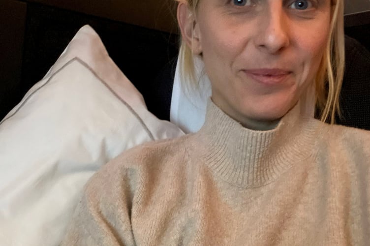 Minna Havstad in bussiness class.  A couple split their parenting duties on flights by buying one ticket in business class and one in economy - and say it makes them "better parents".Keen globetrotters Minna Havstad and husband Andy, both 34, used to find themselves exhausted when they took long-haul flights with daughter Malva, now three.They said Malva's wriggling, coupled with their baggage, snacks and toilet trips, would mean none of them got a wink of sleep and it would make the first day of their holiday extremely tough.So they had the idea to book one seat in business class, and the other in economy alongside a seat for Malva - and they would swap at the halfway point, so each parent got a few hours' peace.After trialling the idea using their flight points to upgrade, the parents said it revolutionised their flights - and they've done it several times since.
