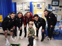 Christmas cardinals as Woking FC spread festive cheer off the pitch