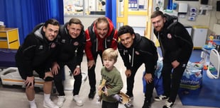 Christmas cardinals as Woking FC spread festive cheer off the pitch