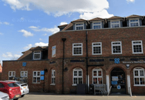 Police investigate burglary at Woking Co-op store