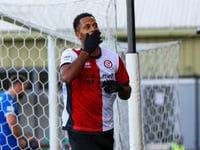 Woking loanee Ashley Boatswain returns to Ipswich Town