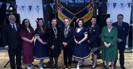 The Committee of the Chobham Branch with Shannon Saise-Marshall, Surrey County Chair, and the Memphis Belles.