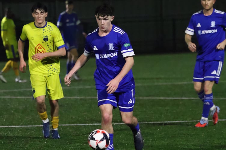 Action from Sheerwater's 1-0 defeat at home to Sutton Common Rovers (Photo: Dan Eicke)