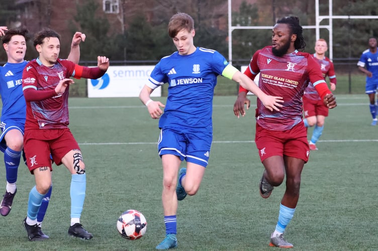 Action from Sheerwater's 3-0 defeat at home to Horley Town (Photo: Dan Eicke)