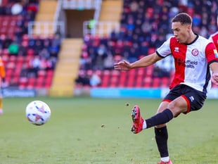 Woking defender Caleb Richards named Cards Trust Player of the Month