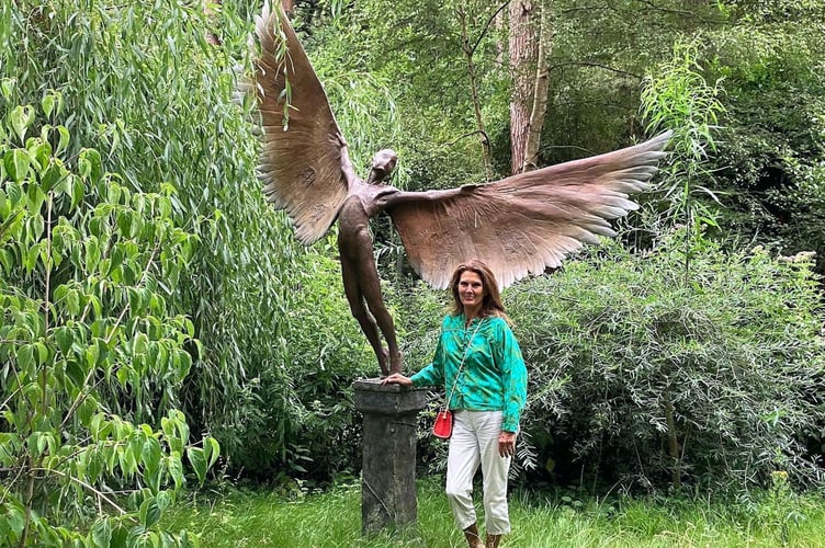 Farnham sculptor Nicola Godden with one of her Icarus sculptures, February 2026.