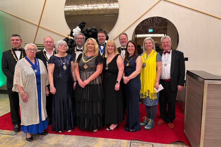 Mayor of Woking, Cllr Amanda Boote, centre, at her Spring Gala Ball with other Surrey mayors and council leaders.