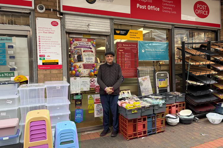 Postmaster Saj Hussain has marked 40 years at Knaphill Post Office.