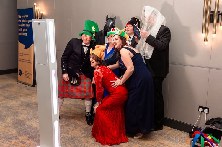 Guests pose for the photo machine at the Woking Mayor's Gala Ball.