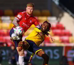 Woking slip to narrow defeat at promotion chasers York City