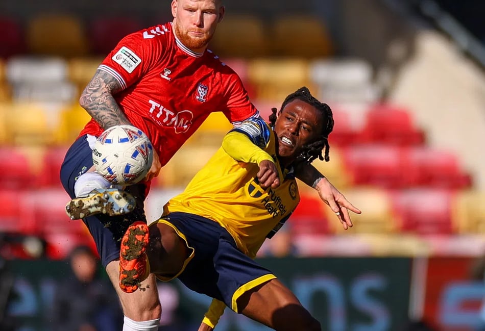 Woking slip to narrow defeat at promotion chasers York City