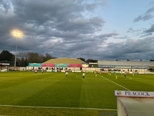 Woking come from behind to earn point at home to nine-man Altrincham