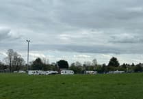 Travellers back in Woking as convoy pitches on Knaphill park