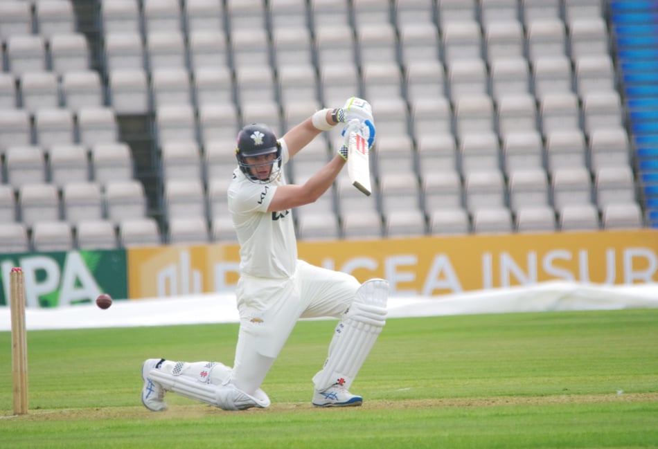 Smith and Lawrence save Surrey from defeat