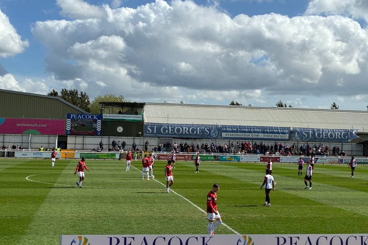 Action from Woking's National League game against Morecambe
