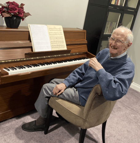 93-year-old Greenview Hall resident David Wiltshire at the piano during rehearsals for the home’s newly formed choir, following the fulfilment of his wish to return to music.