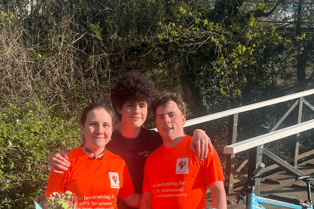 JJ and Imo Rowe with their brother Harry during their 53km run along the Basingstoke Canal in Hook Heath in aid of Burning Nights CRPS. Credit: JJ & Imo Rowe