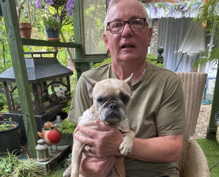 Ken Ash with seven-year-old French bulldog Luna, who is undergoing chemotherapy after being diagnosed with lung cancer. Credit: Ken Ash