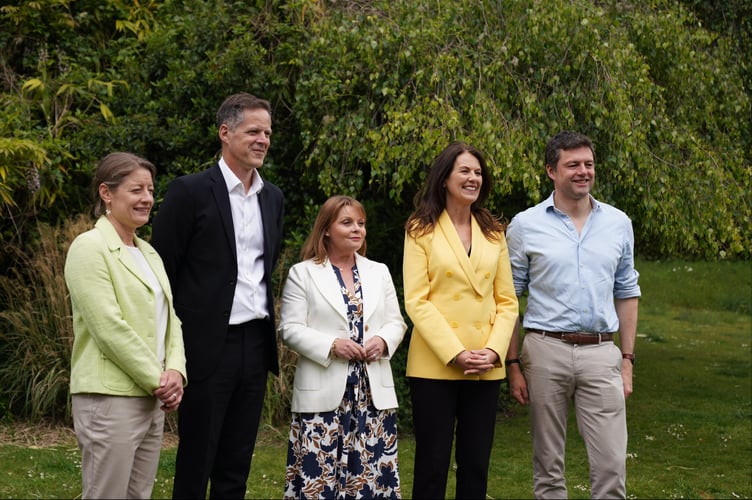 New Liberal Democrat group leaders at East Surrey Council, councillors Steve Wotton and Kirsty Hewens, with Lib Dem MPs.