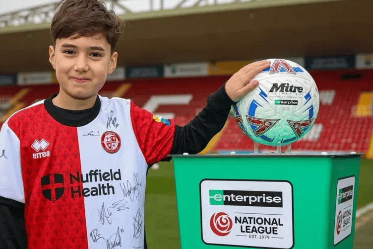 Woking Football Club mascot, Kingfield, Woking, June 26th 2026.
