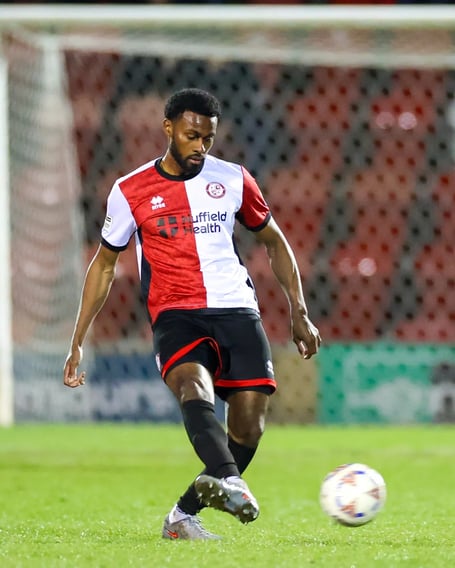 Woking defender Tunji Akinola has signed a new contract with the club (Photo: Phil Fiddes)