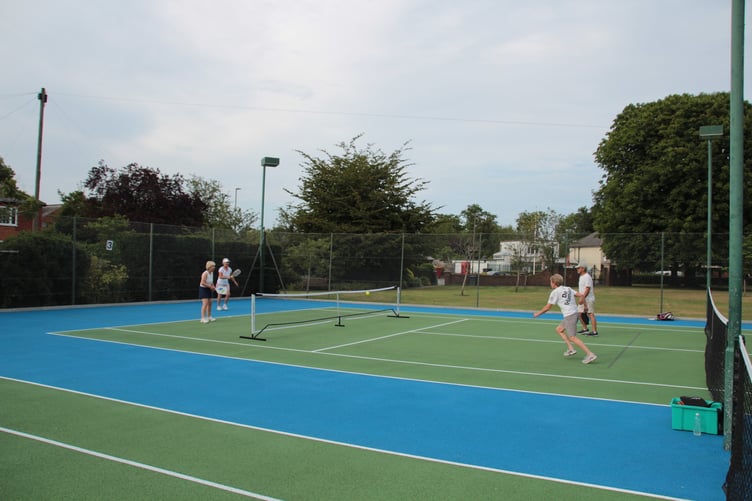 The club’s new pickleball courts in action