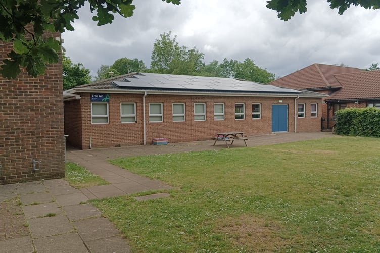 Front of A2 community hall with solar panels