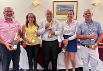 Keen golfers swing into action for charity day