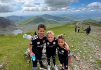 Young trio reach Snowdon summit in remarkable hospice fundraiser